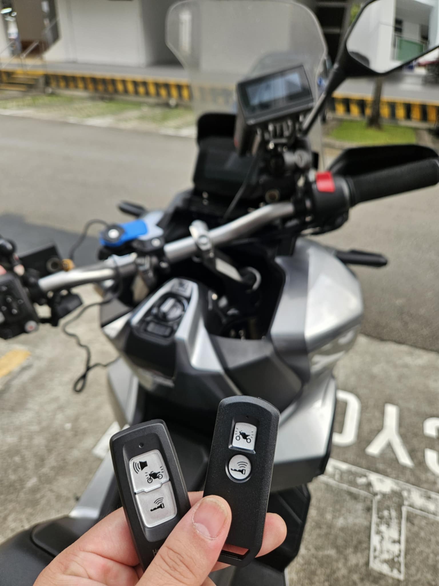 Two motorcycle smart key FOBs duplicated for a keyless motorcycle