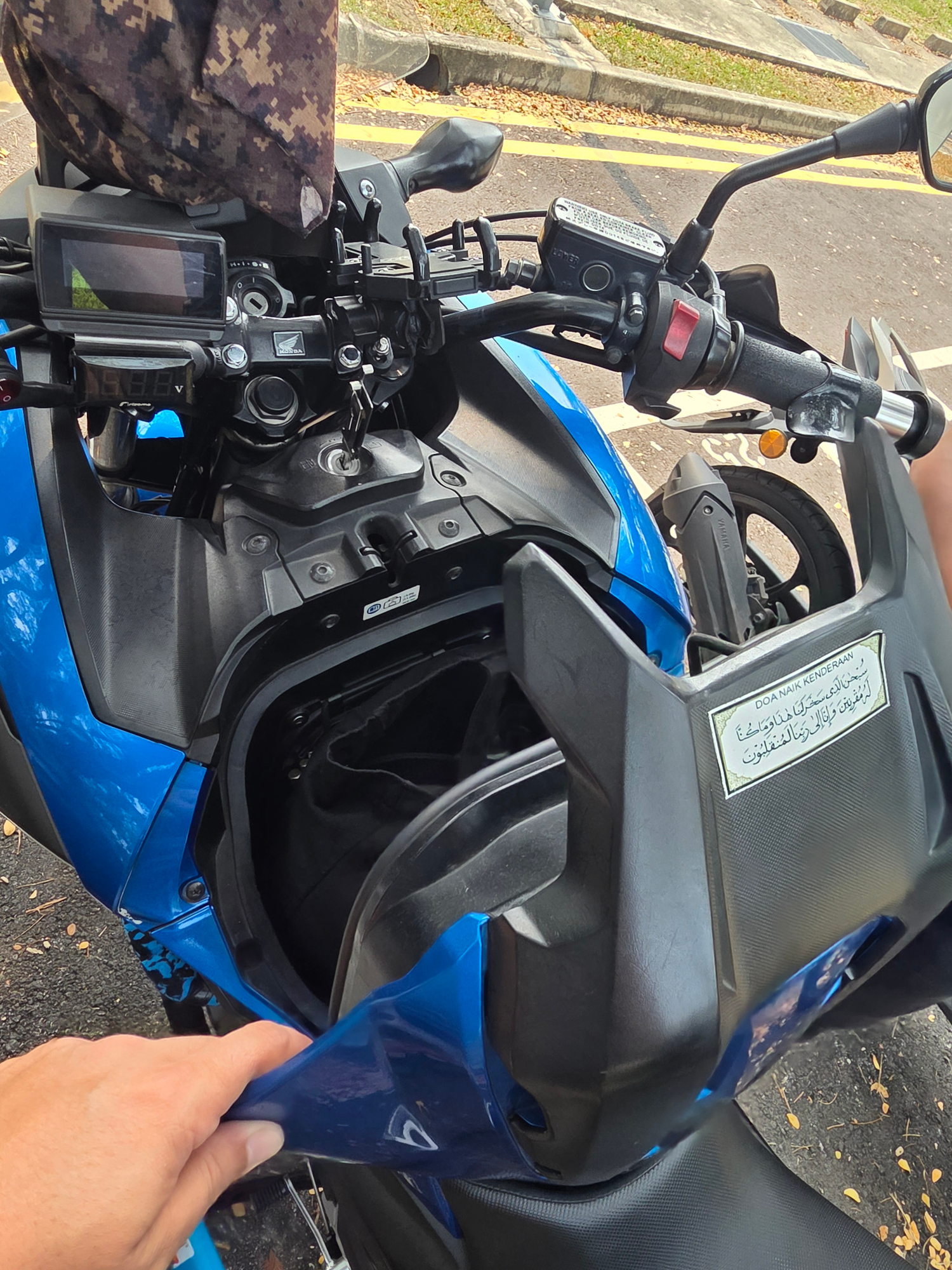 Motorcycle storage compartment unlocking service